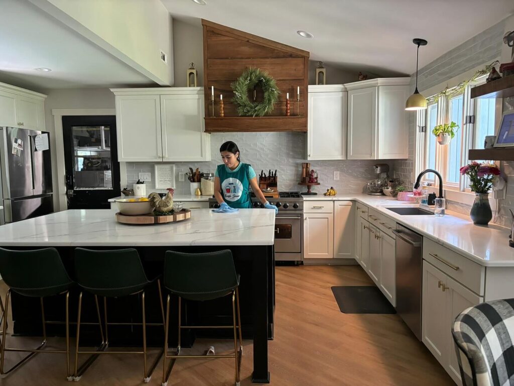 Fresh Shine Cleaning Maid cleaning a beautiful kitchen